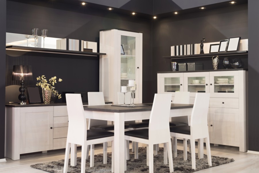 black dining room with white cabintry