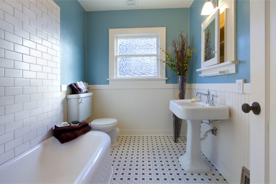 blue bathroom white wainscotting