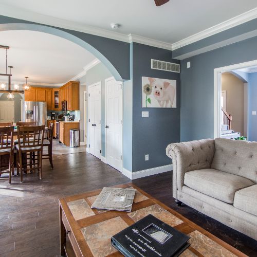 chalky blue paint color in open living room