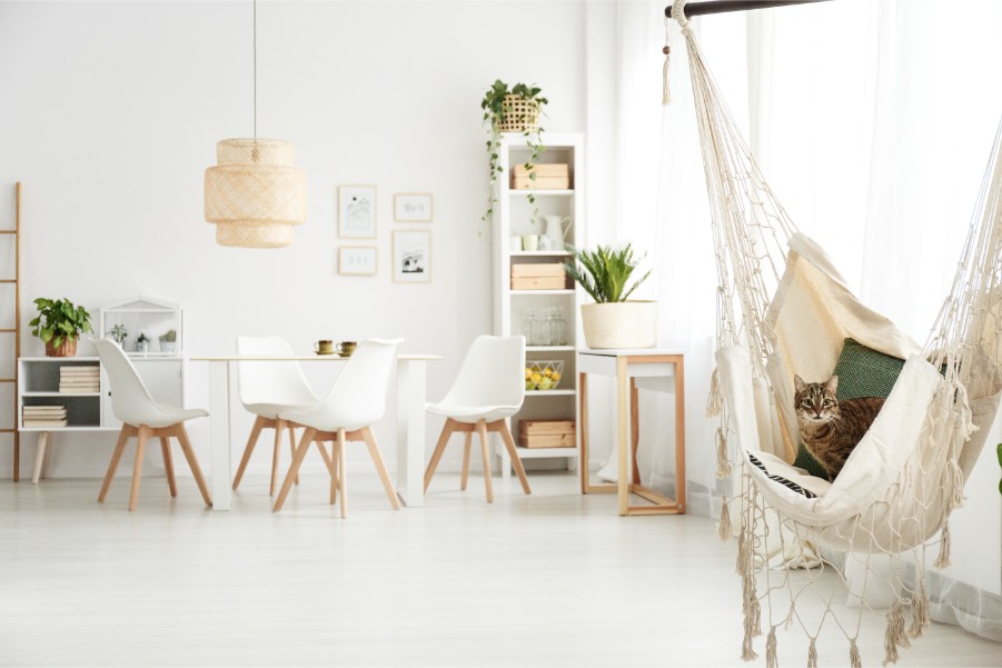 boho living room with hanging chair